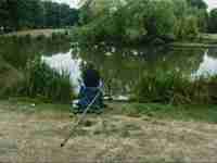 fishing at Eagle Pond on Clapham Common